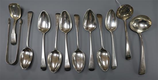 A matched set of eight silver Old English pattern dessert spoons and four other items, total 13oz approx